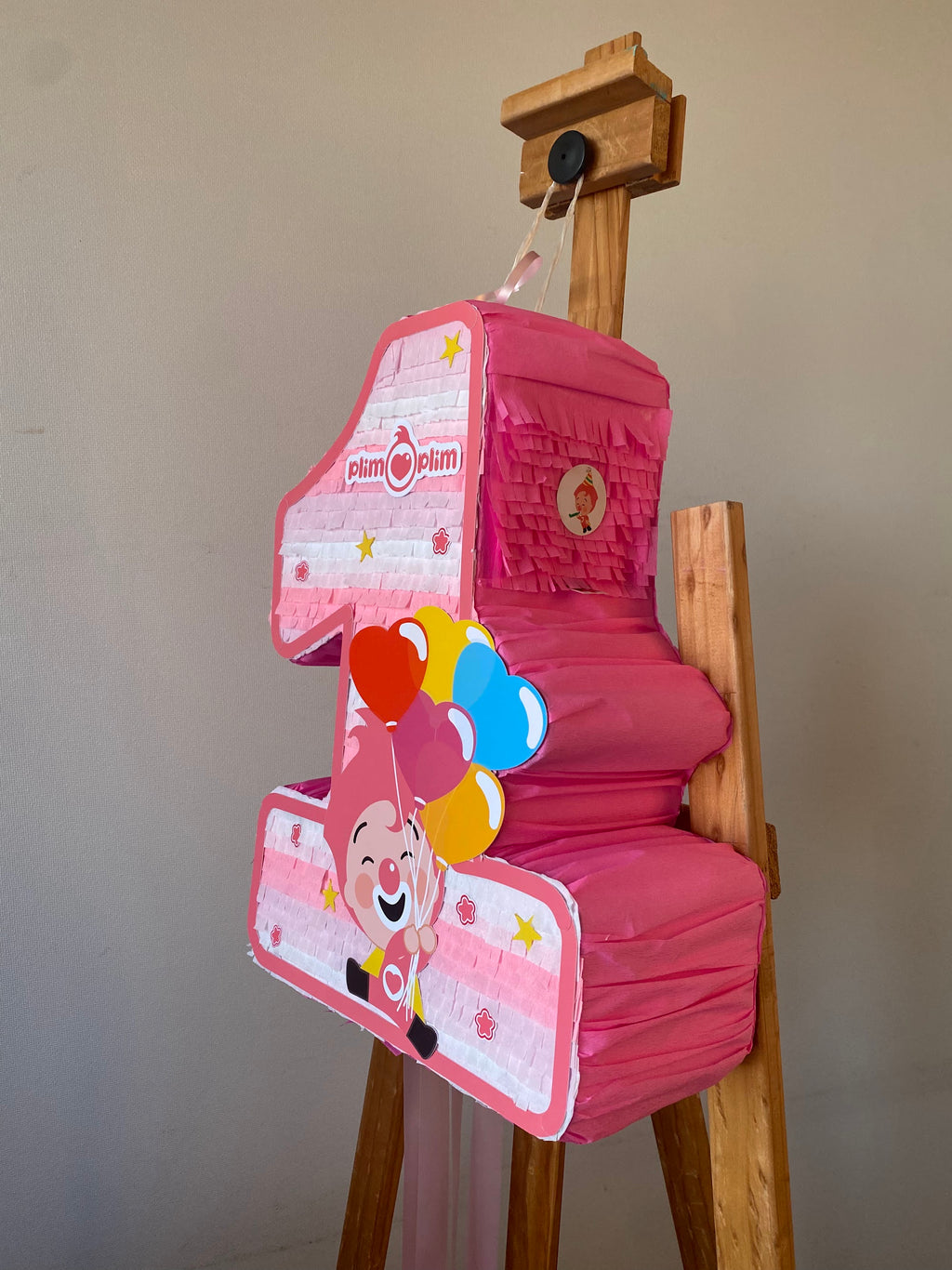 PIÑATA PAYASO PLIM PLIM NÚMERO 1 ROSADO 40CM PREMIUM