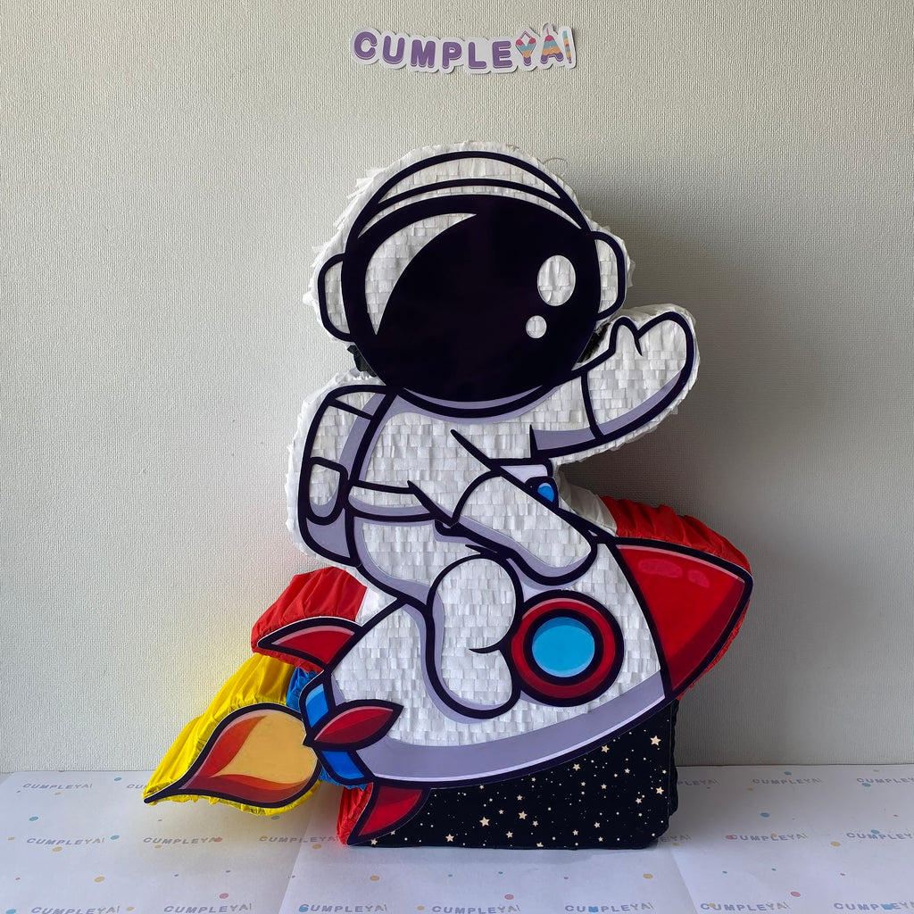 PIÑATA ASTRONAUTA CON COHETE 60CM PREMIUM