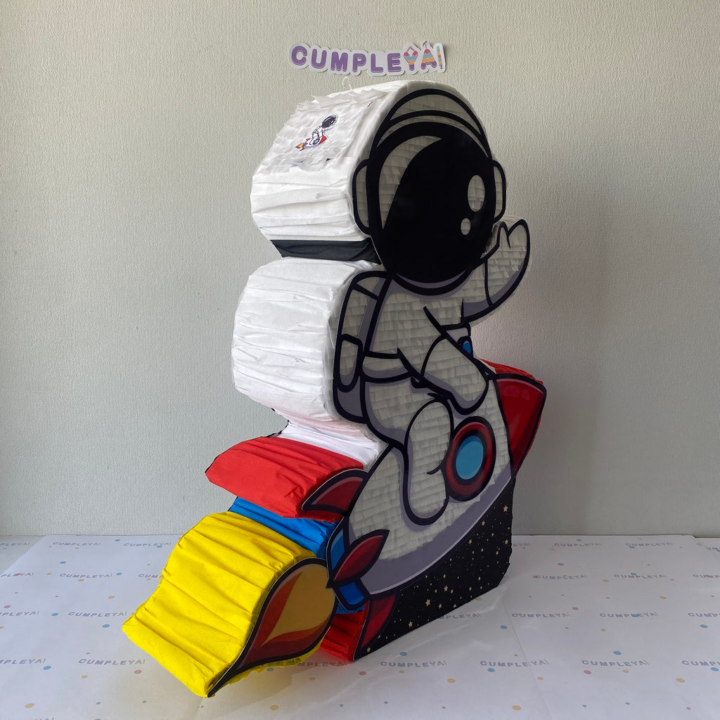 PIÑATA ASTRONAUTA CON COHETE 60CM PREMIUM