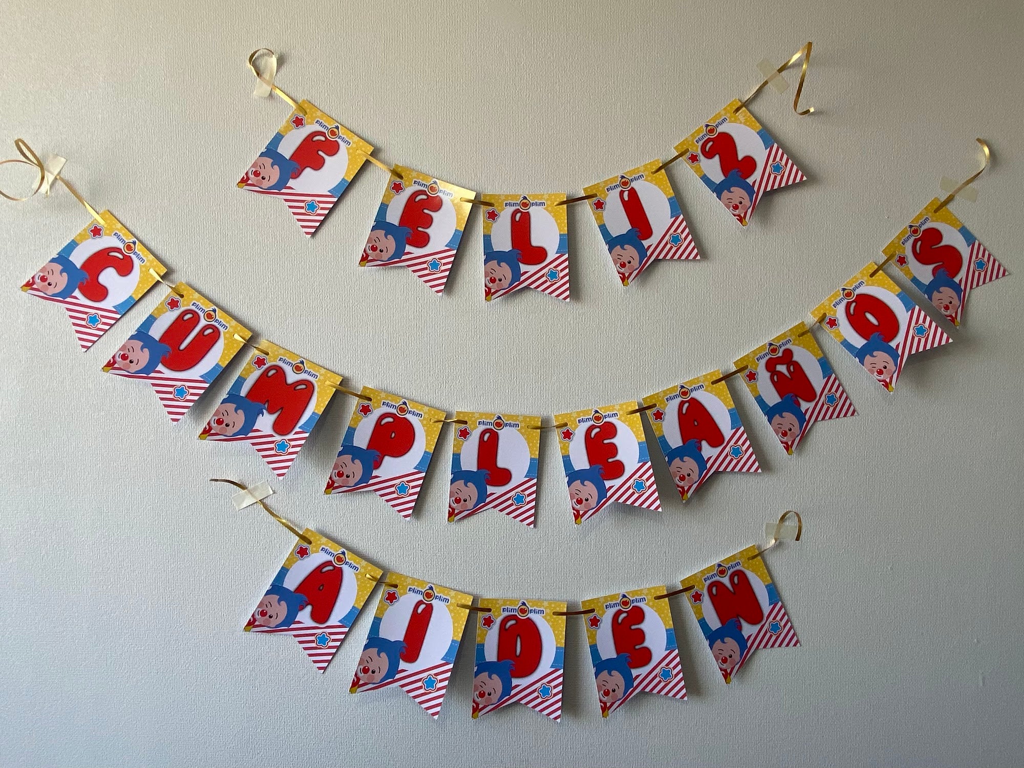 BANDERIN PLIM PLIM FELIZ CUMPLEAÑOS 11X14CM 15U TEMÁTICO