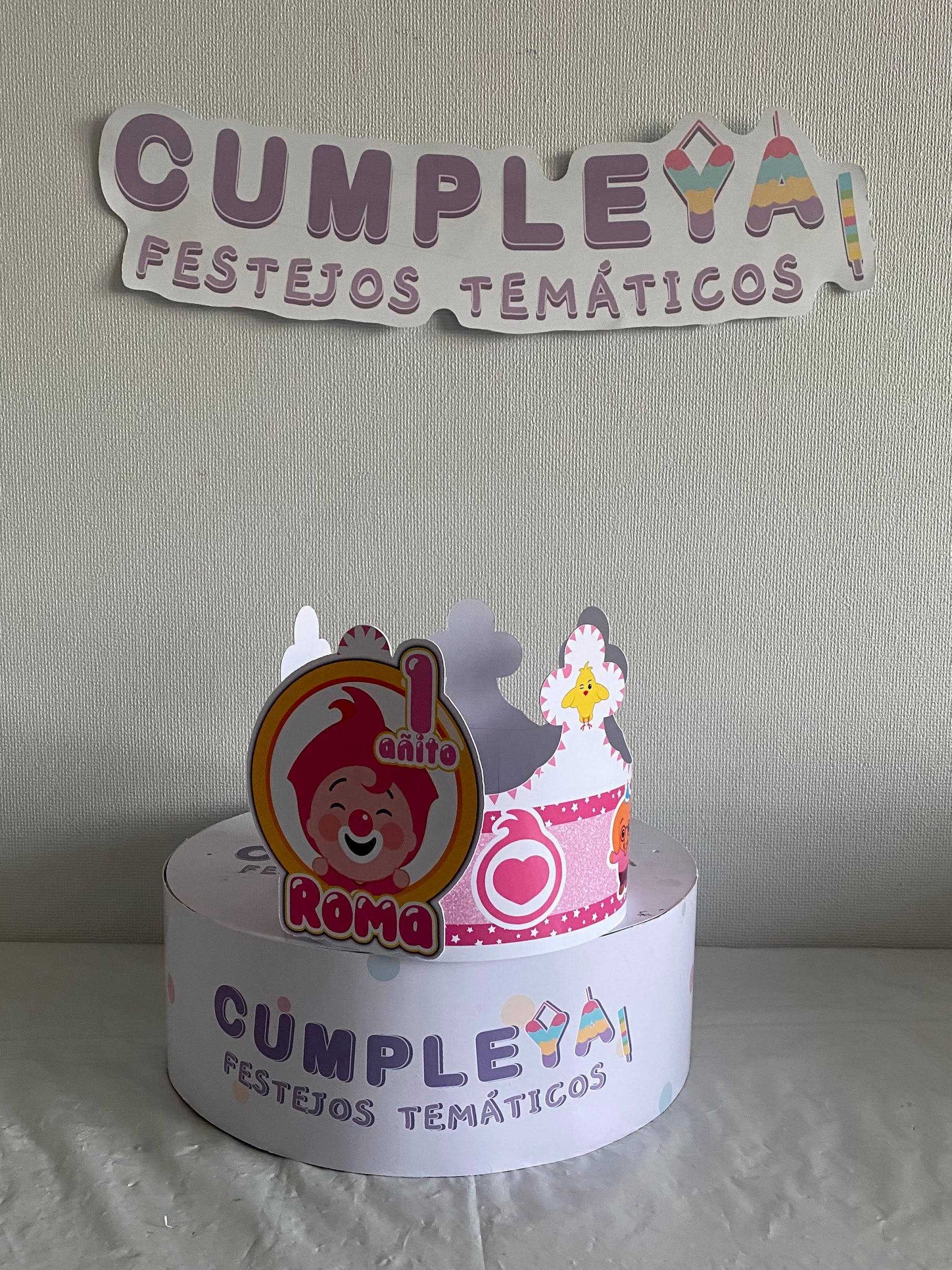 CORONA PLIM PLIM ROSADO 62X14CM