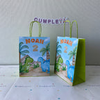 BOLSA SORPRESA 16 × 21 × 8 CM DINOSAURIO BEBES