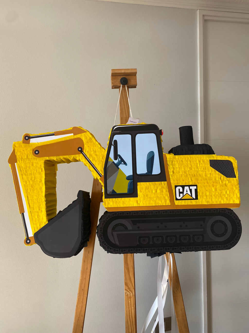 PIÑATA CAMIÓN EXCAVADORA CAT 60CM PREMIUM