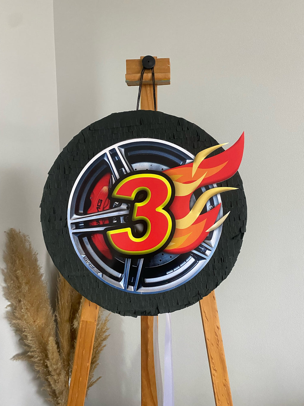 PIÑATA RUEDA DE AUTO 40CM PREMIUM