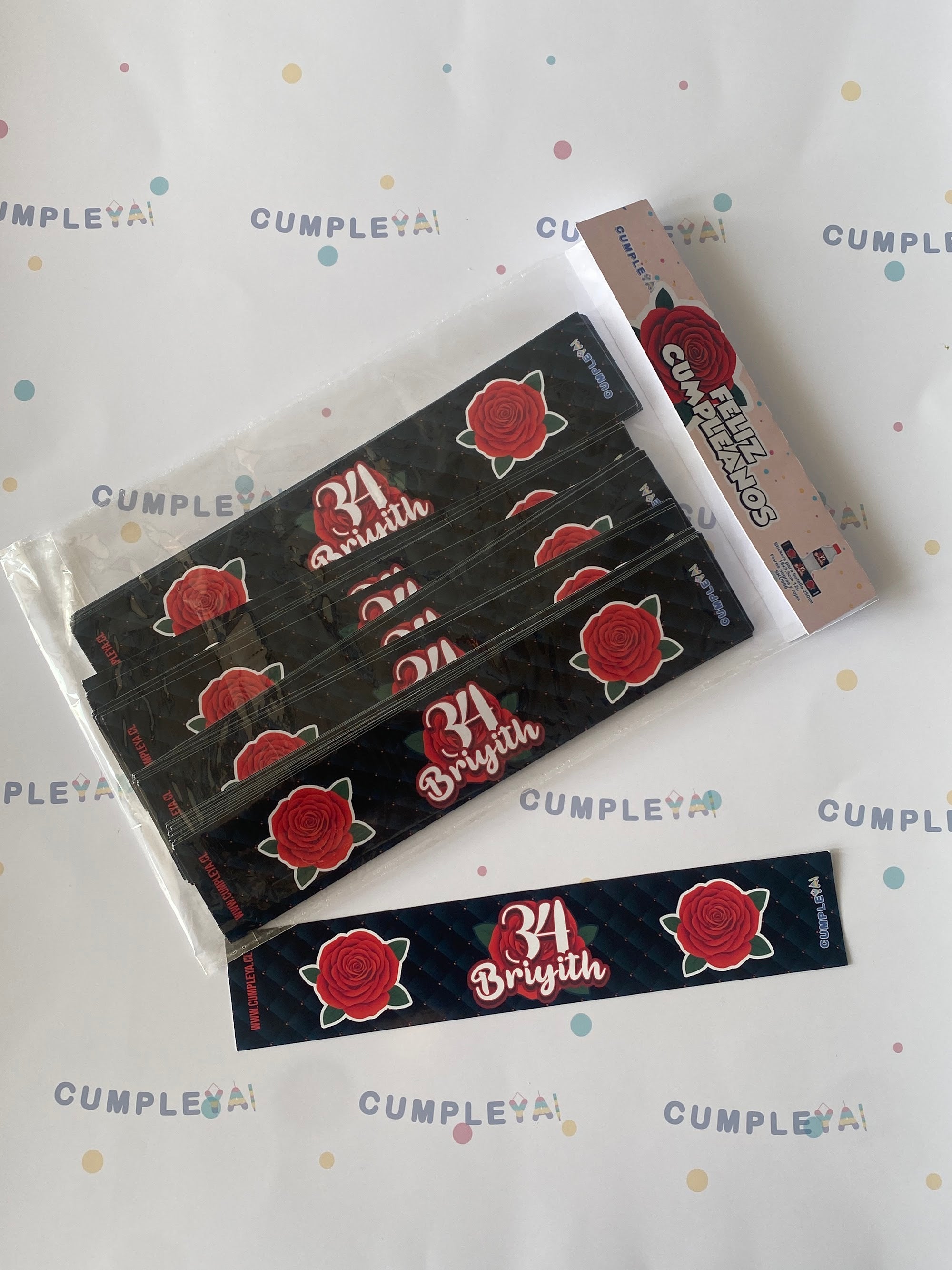 STICKER FLORES NEGRAS Y ROJAS PARA BOTELLA 250ML 18X3, 5CM SET 12U TEMÁTICO